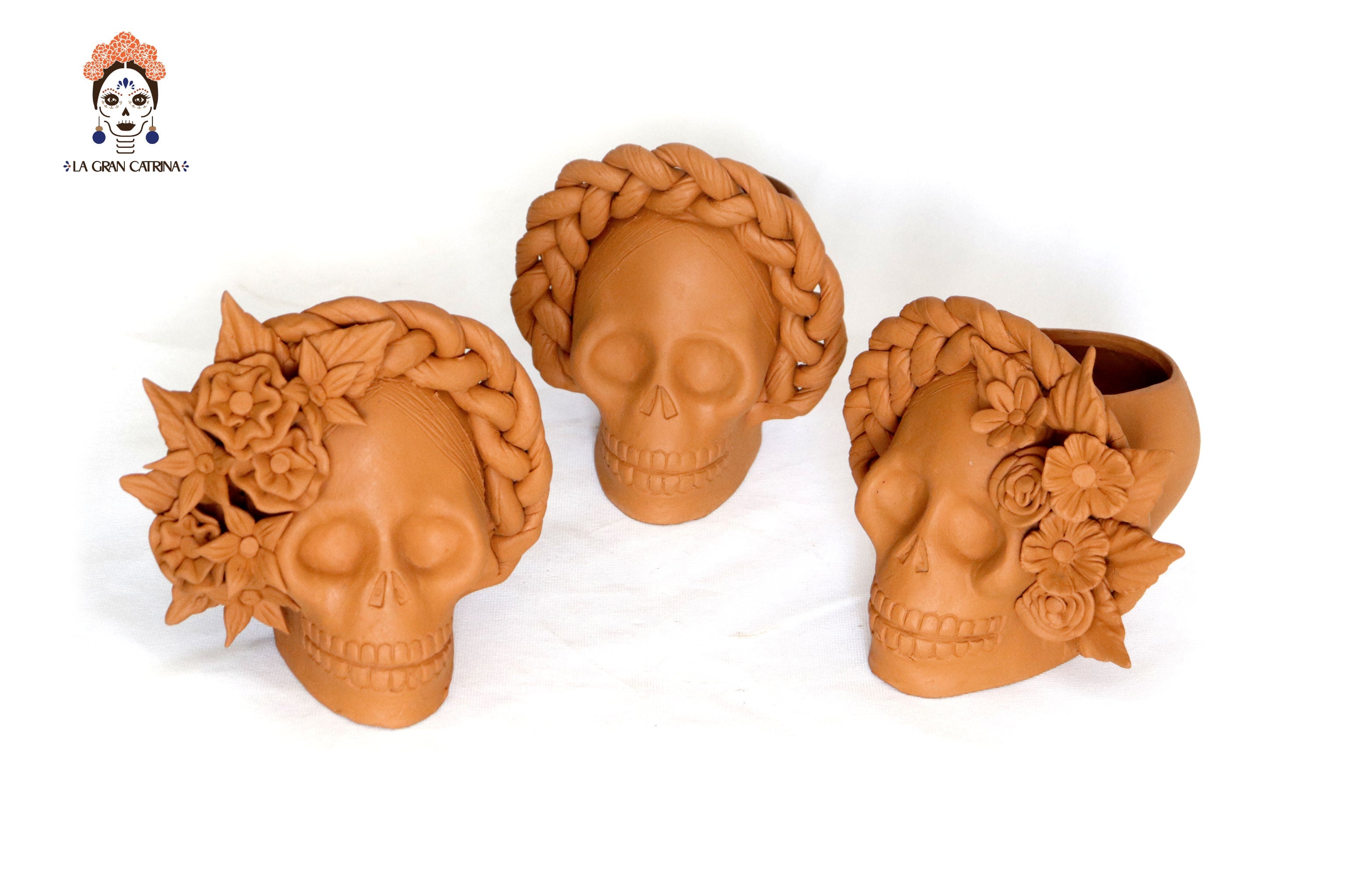 Trio of skulls - Planters medium orange Brenda Capula