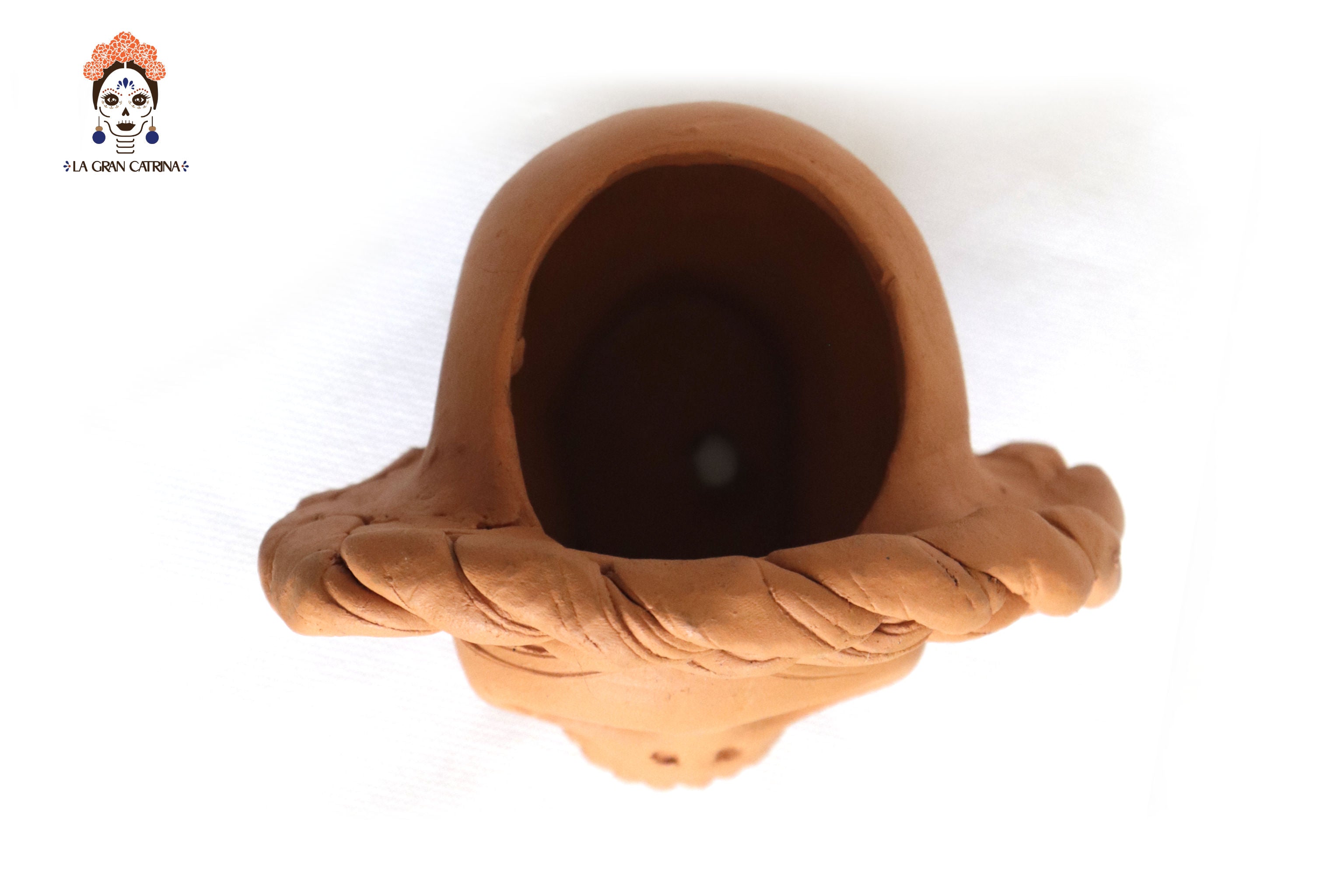 Planter of skulls small orange of topknot Brenda Capula