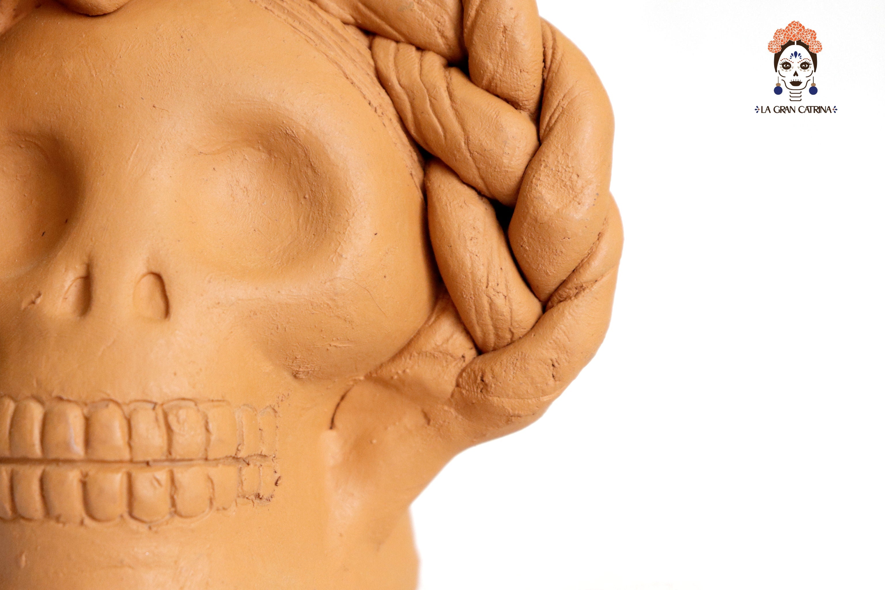 Planter of skulls small orange of topknot with Flowers Brenda Capula