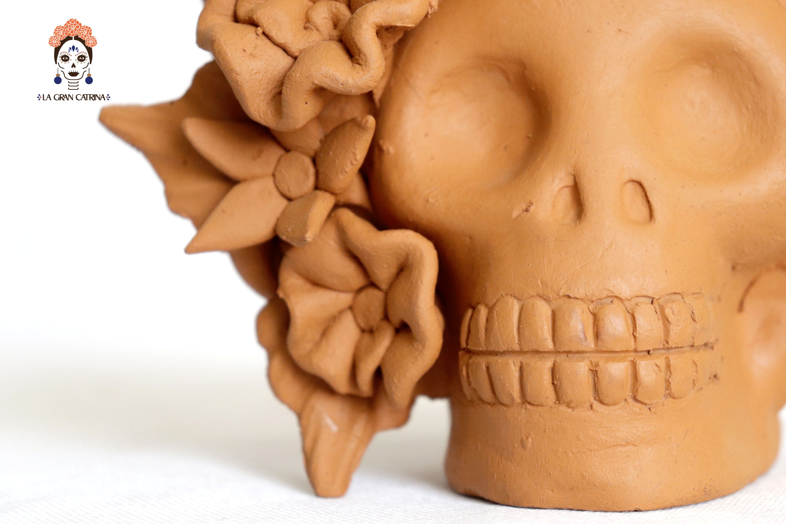 Planter of skulls small orange of topknot with Flowers Brenda Capula