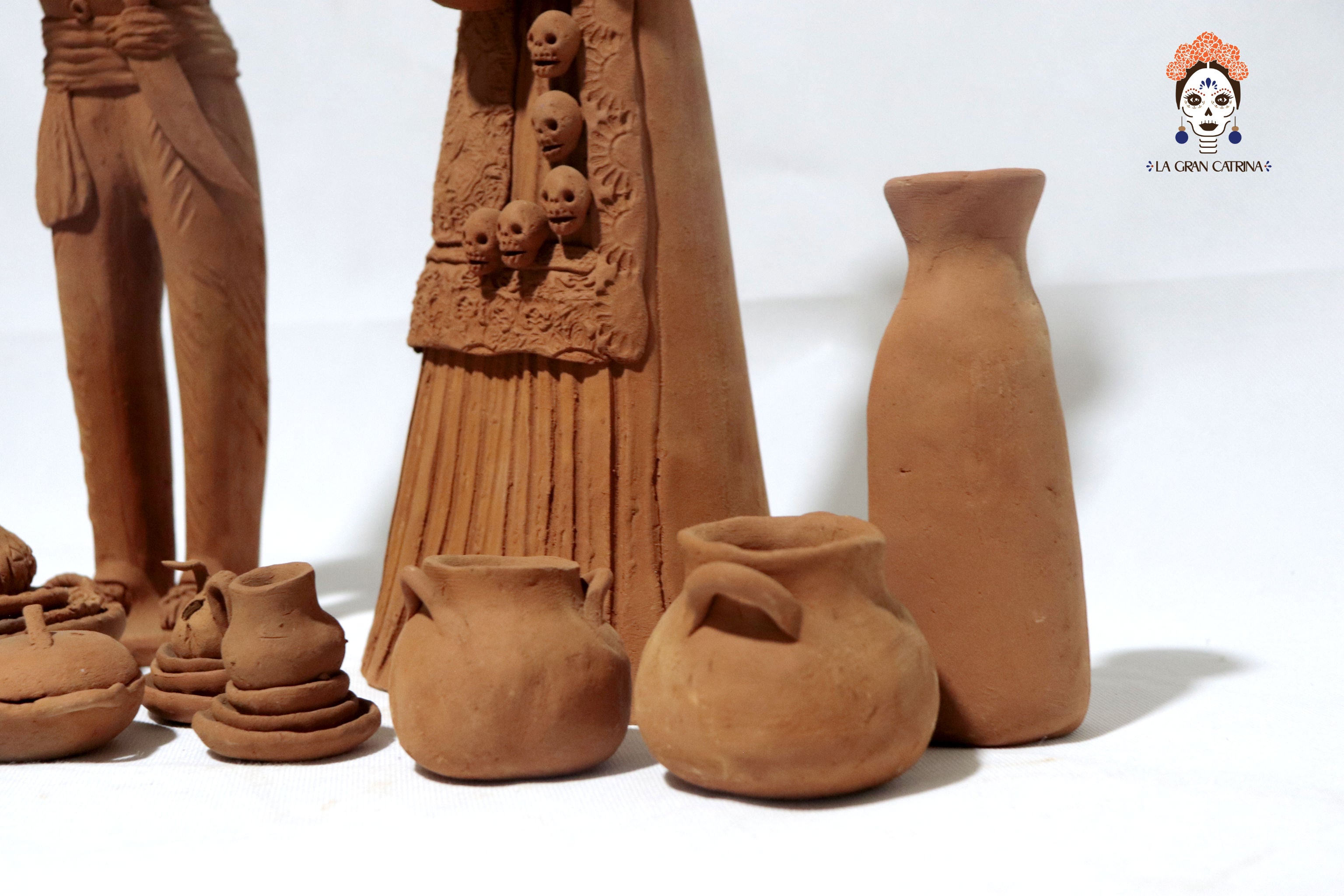 Pair of Catrines artesanos of loza - 20 in. Erika Capula