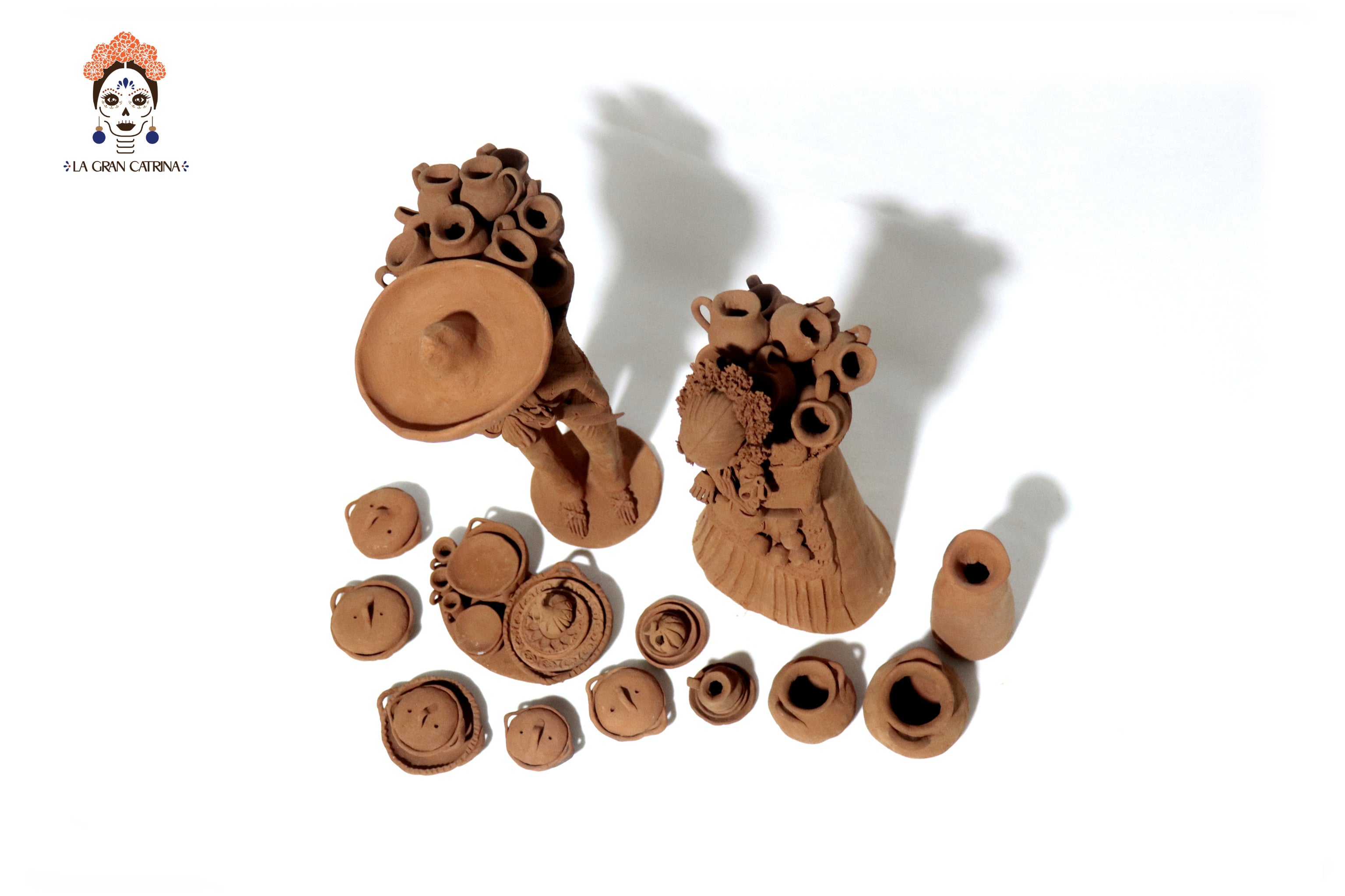 Pair of Catrines artesanos of loza - 20 in. Erika Capula