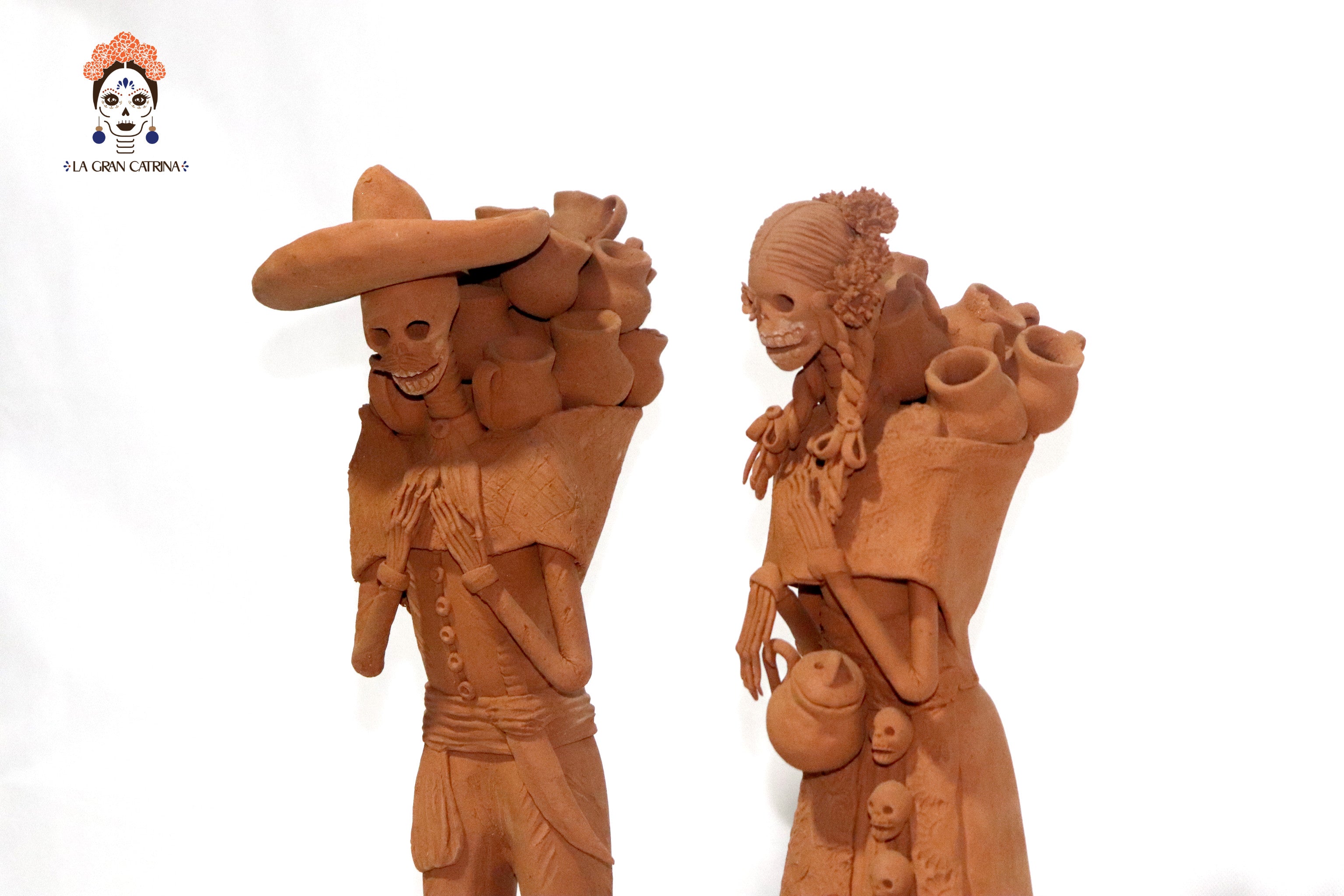 Pair of Catrines artesanos of loza - 20 in. Erika Capula