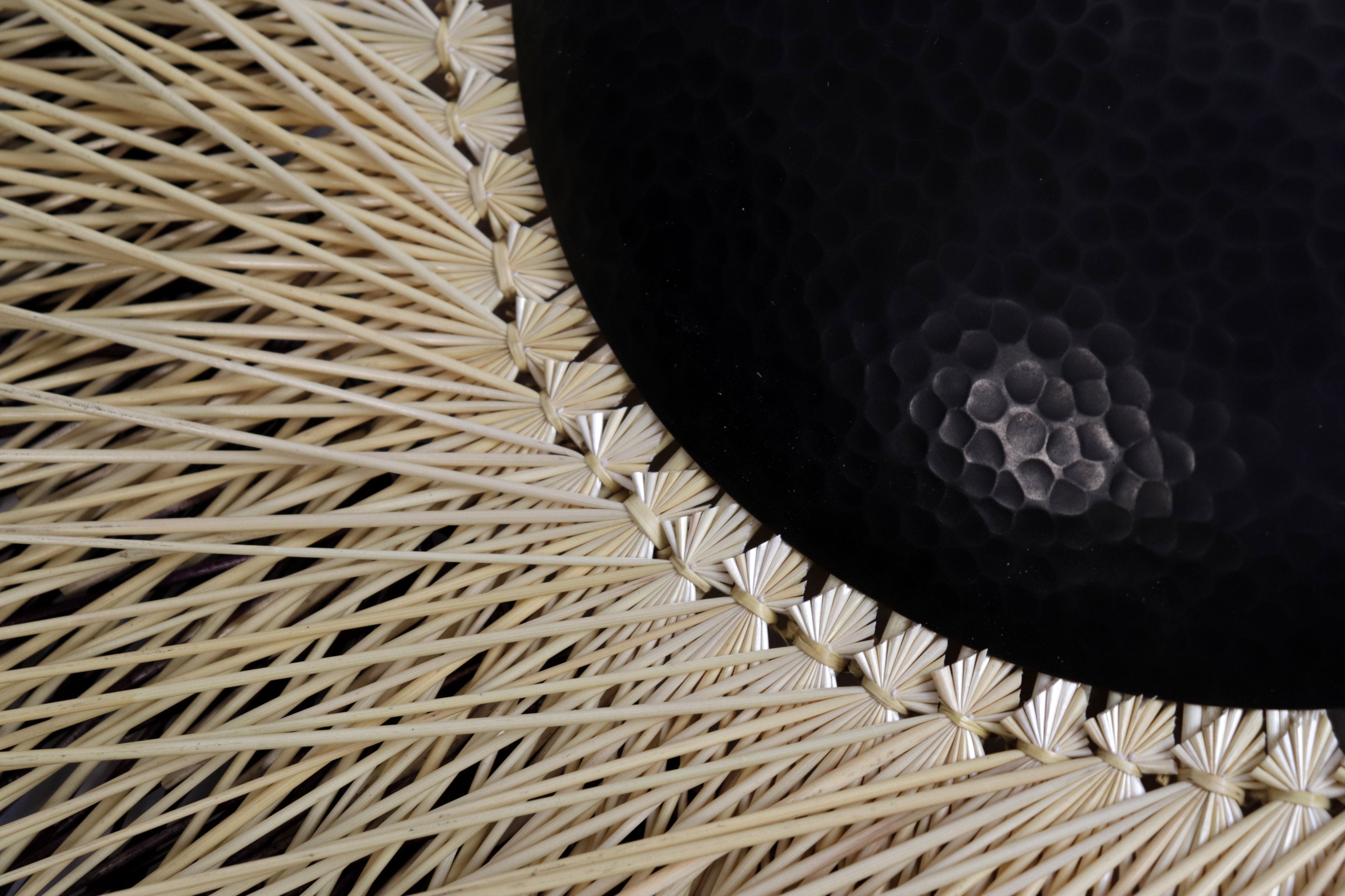 Large 40 in. hand-woven wheat straw wall circle, black eclipse design with hammered copper ring