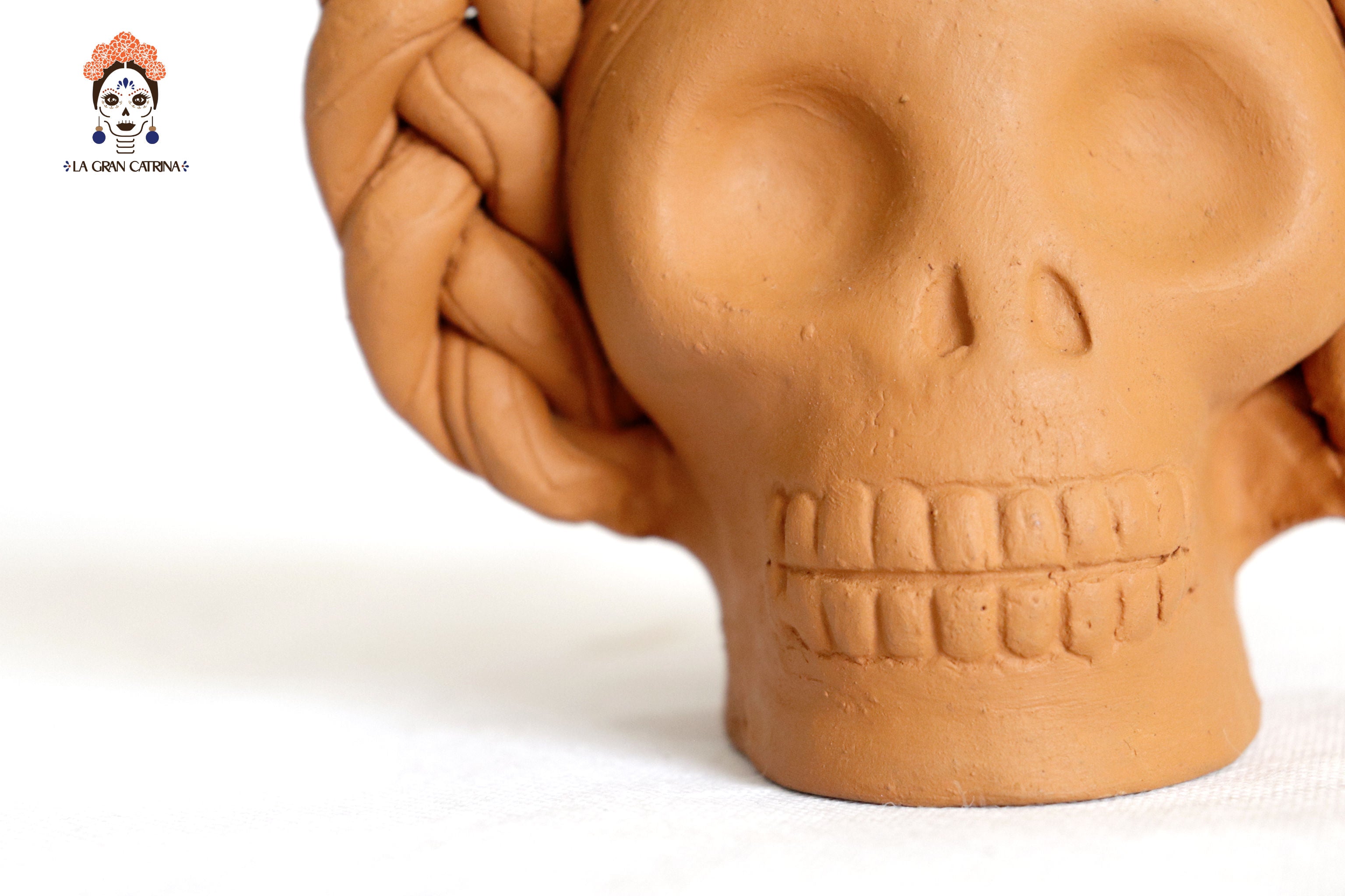 Planter of skulls small orange of topknot Brenda Capula