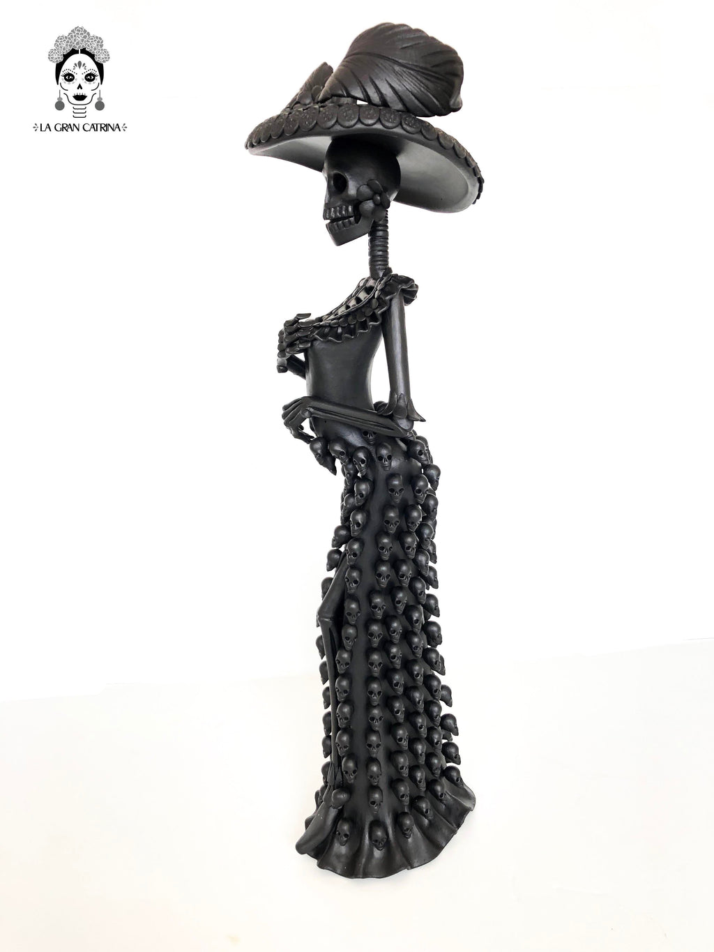 Catrina with vestido of skulls - 24 in. Adan