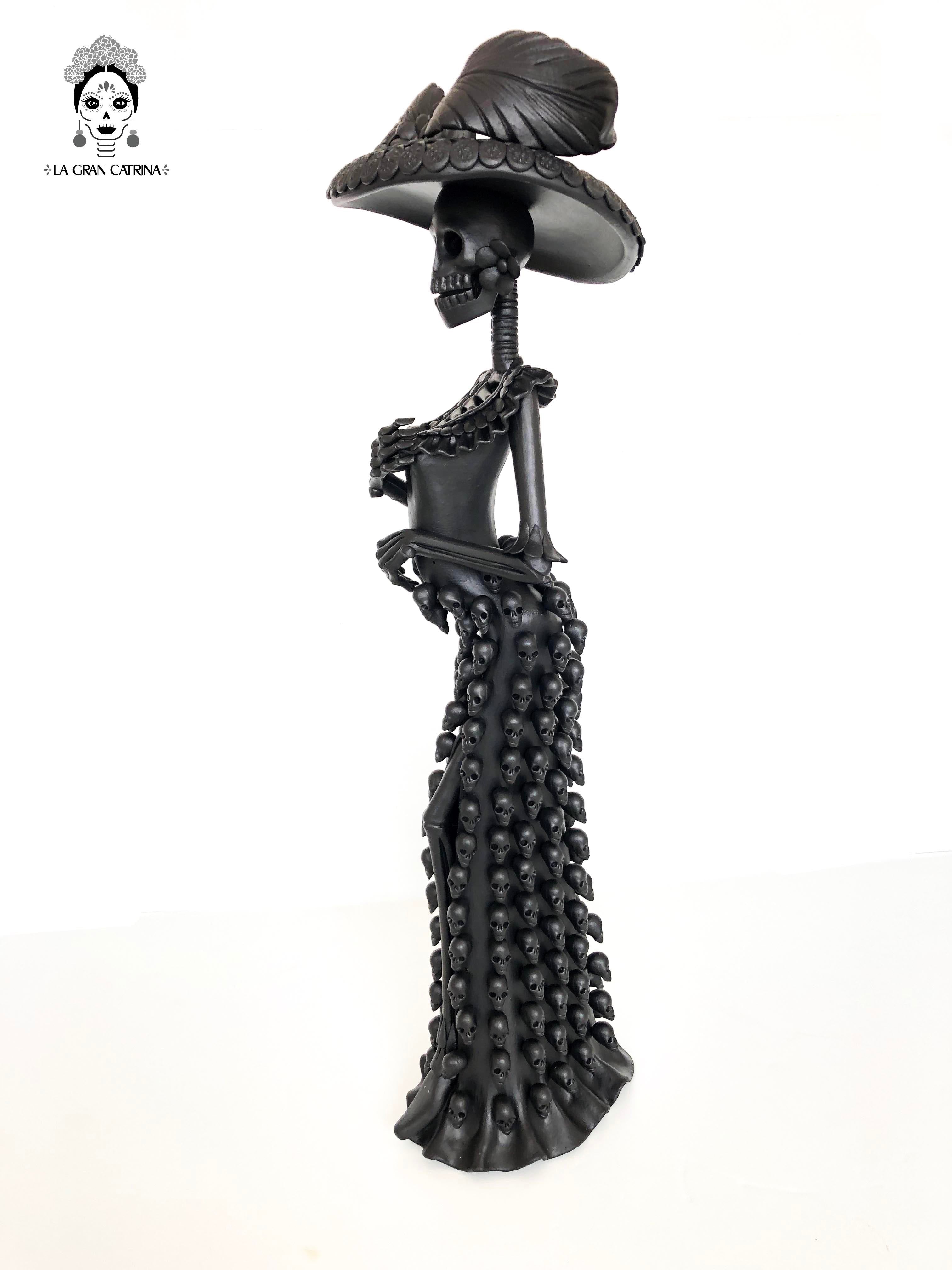 Catrina with vestido of skulls - 24 in. Adan