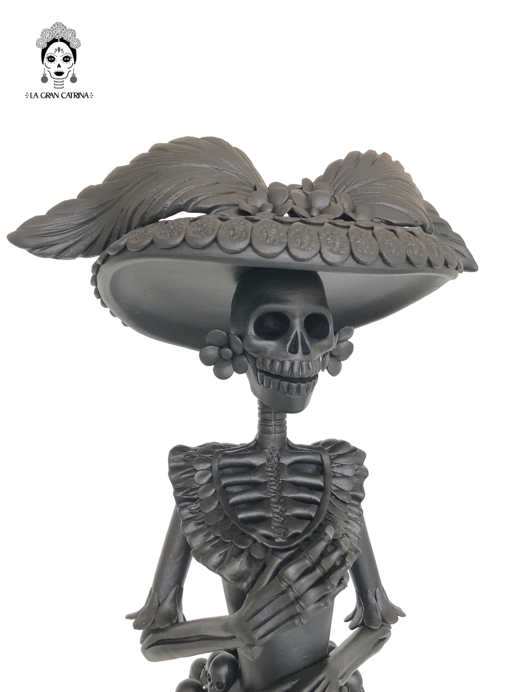 Catrina with vestido of skulls - 24 in. Adan