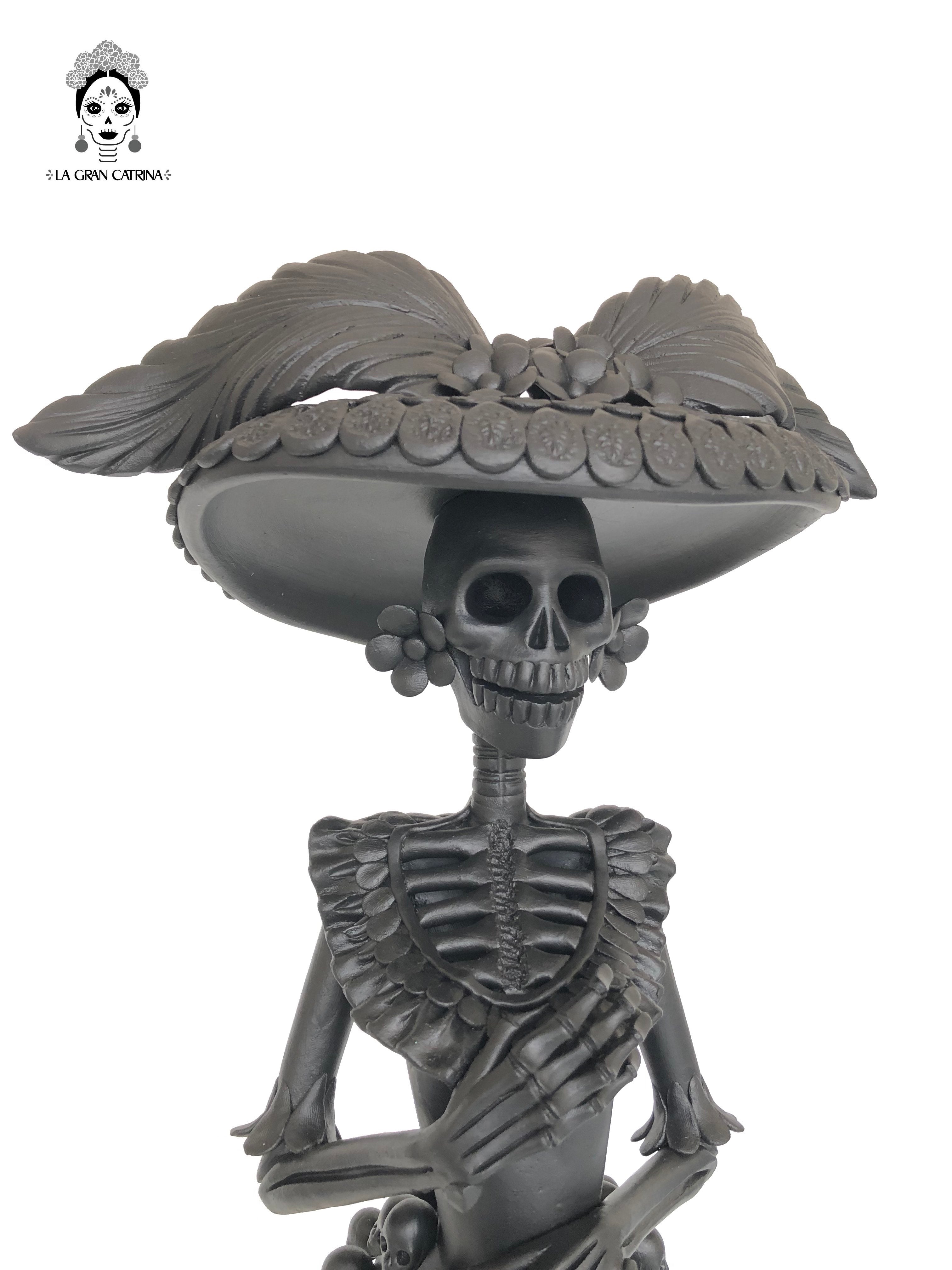 Catrina with vestido of skulls - 24 in. Adan