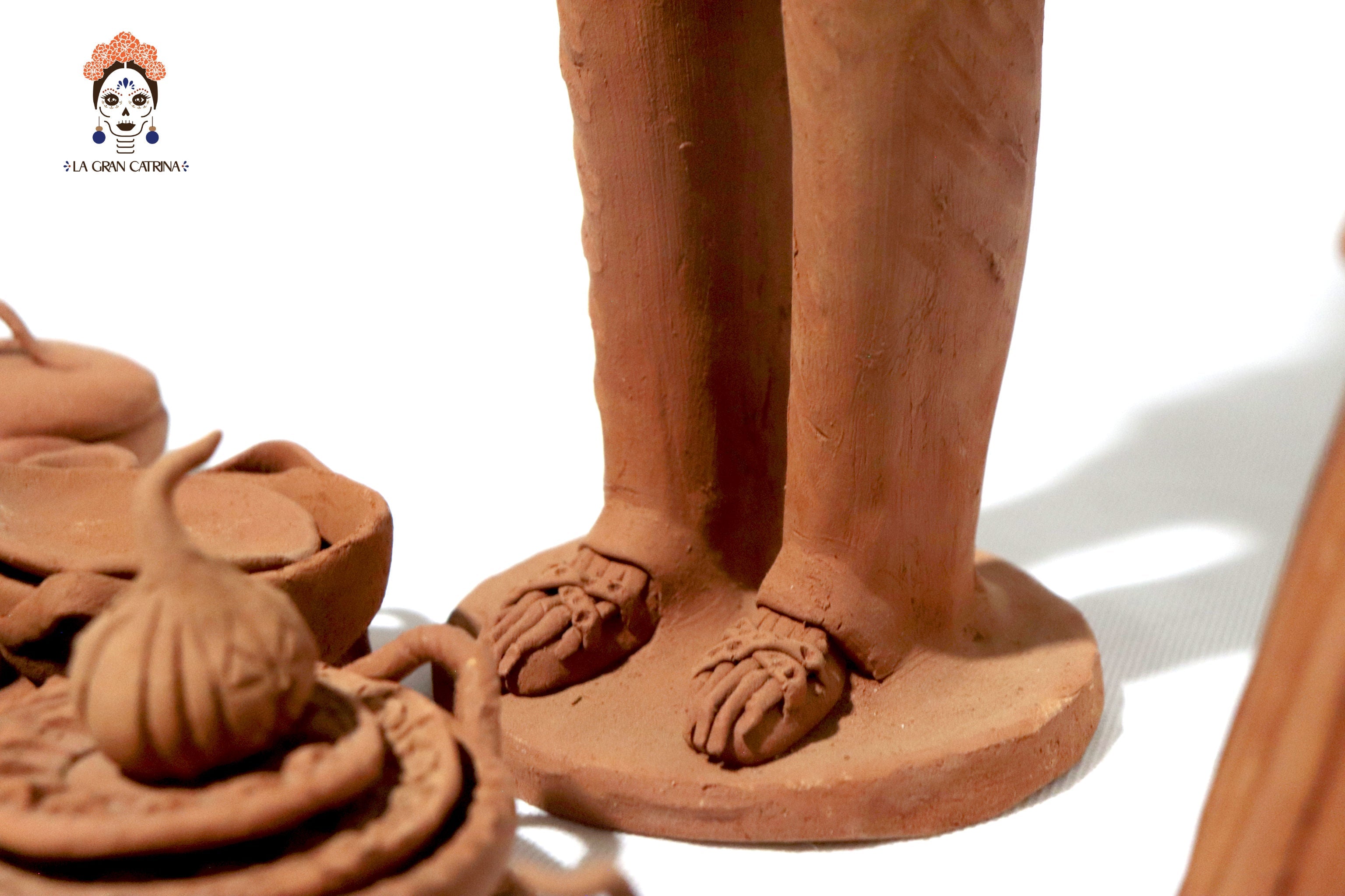 Pair of Catrines artesanos of loza - 20 in. Erika Capula