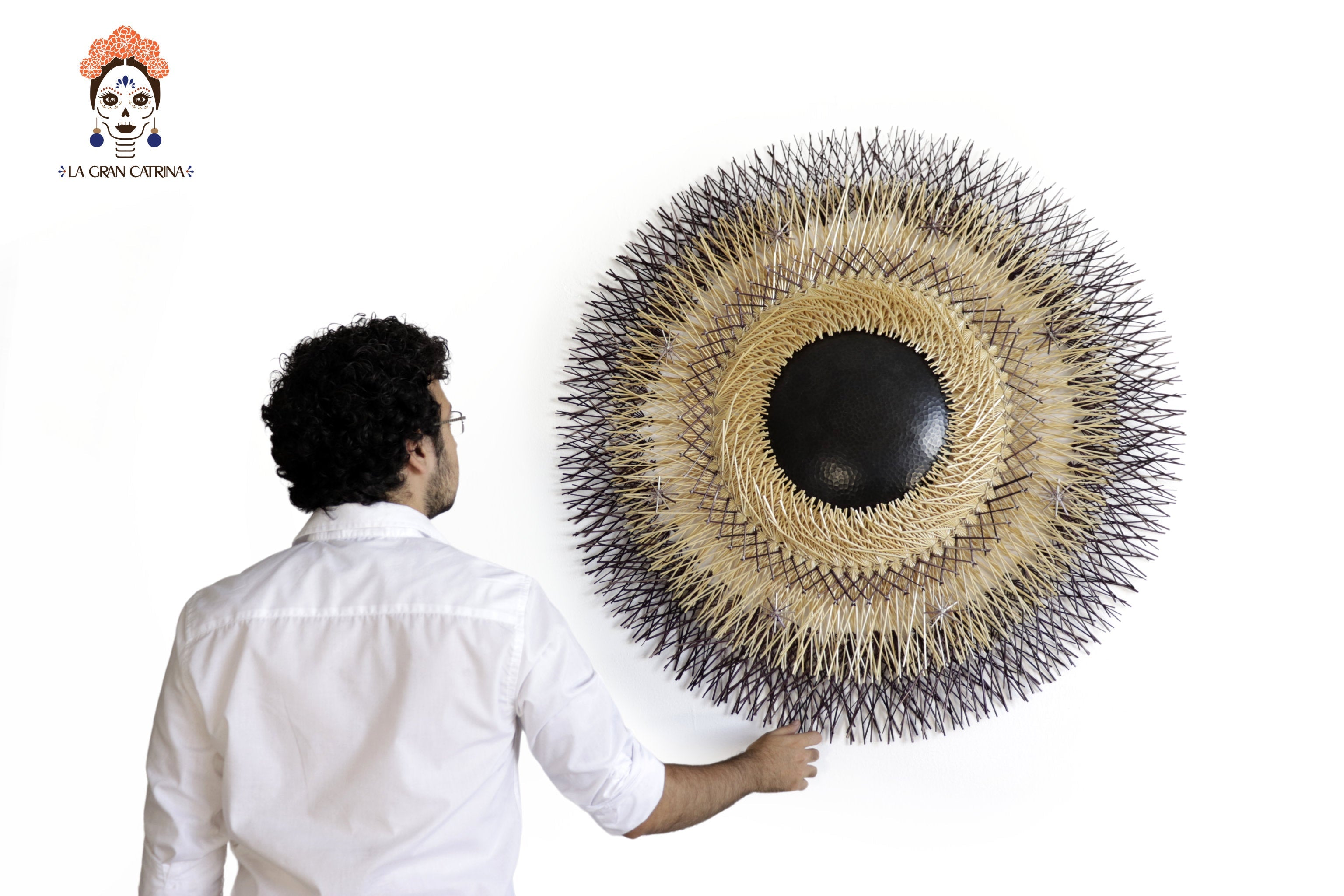 Large 40 in. hand-woven wheat straw wall circle, black and copper design, Michoacán folk art