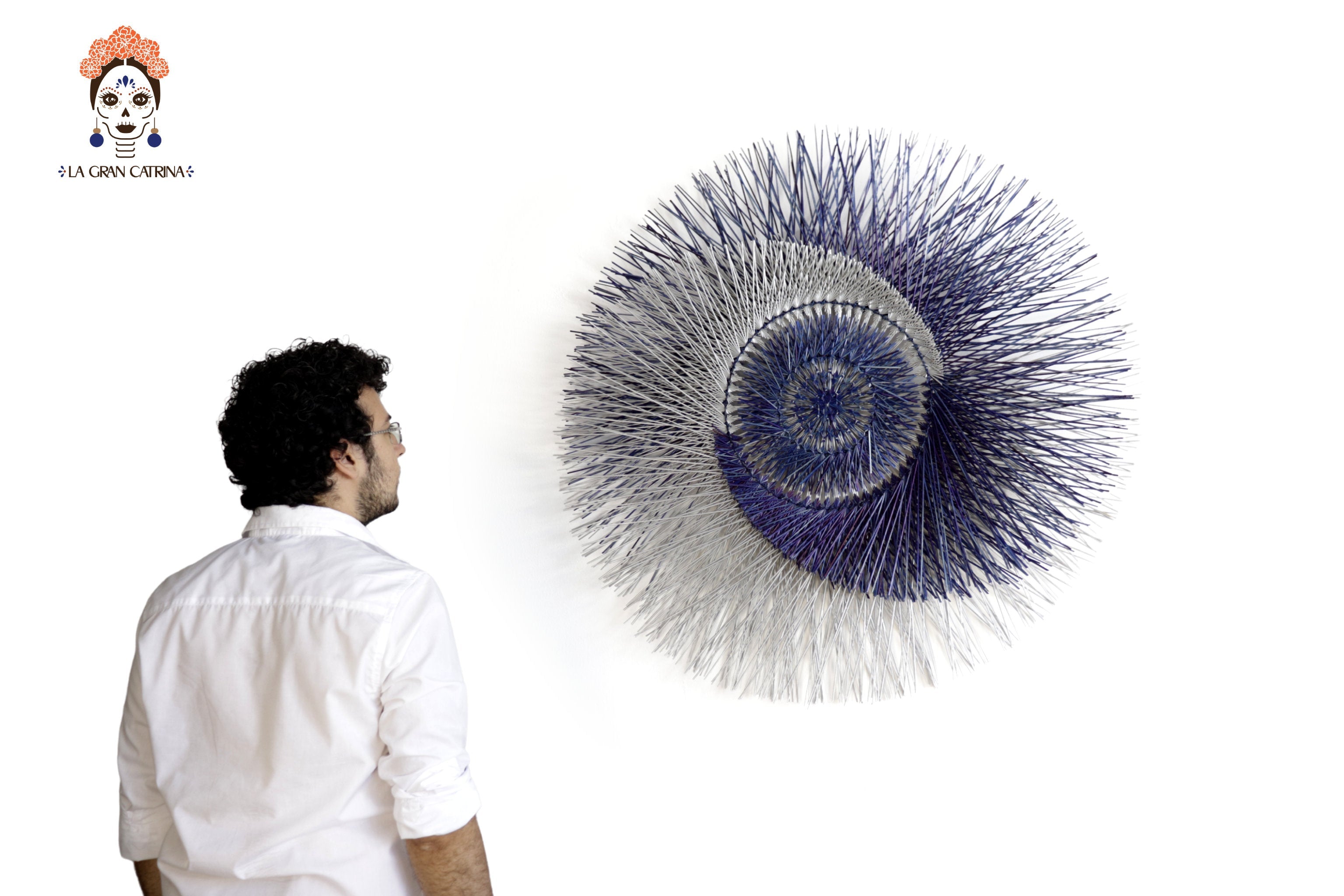 Large 40 in. hand-woven wheat straw wall circle, blue eclipse design with hammered ring