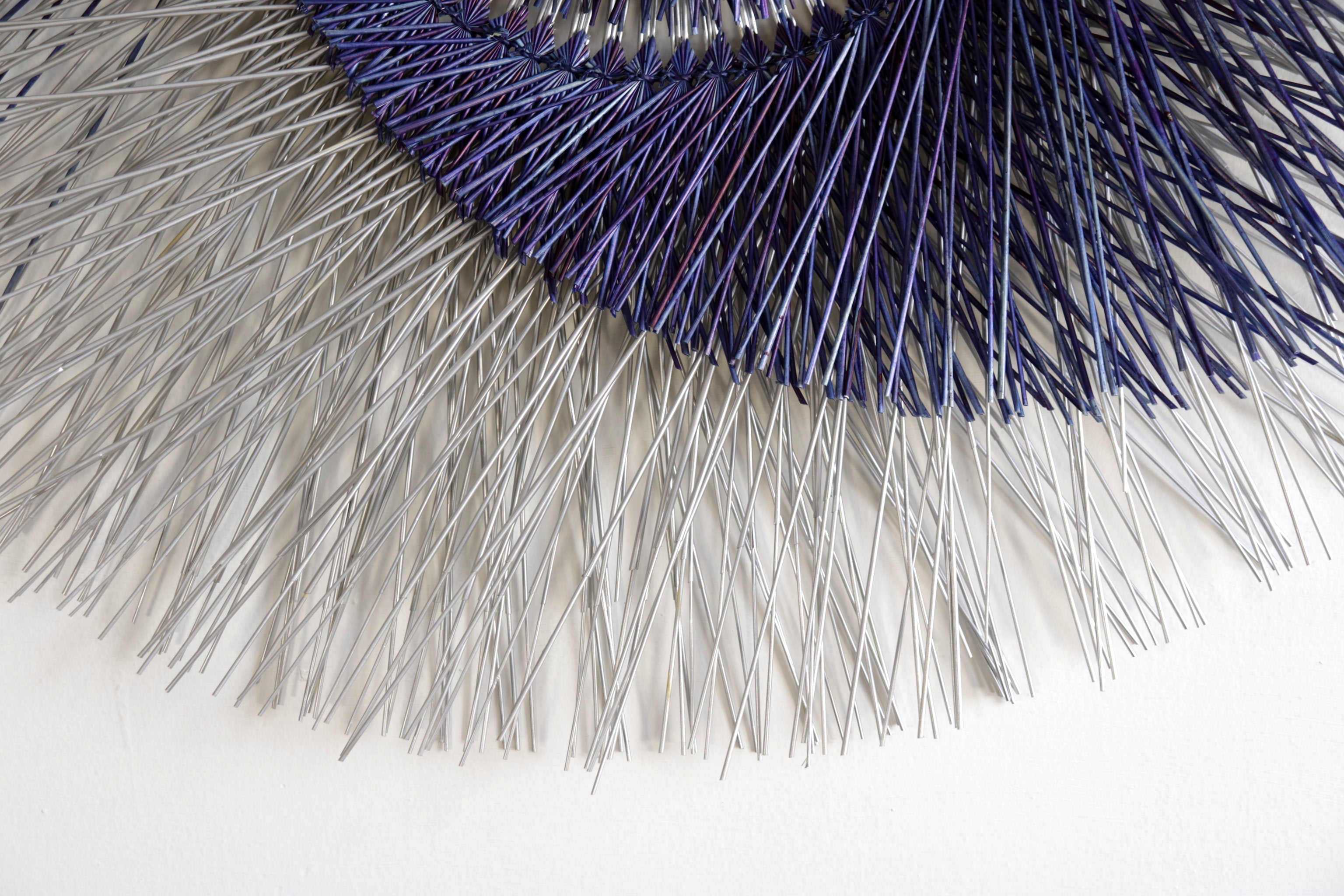 Large 40 in. hand-woven wheat straw wall circle, blue eclipse design with hammered ring