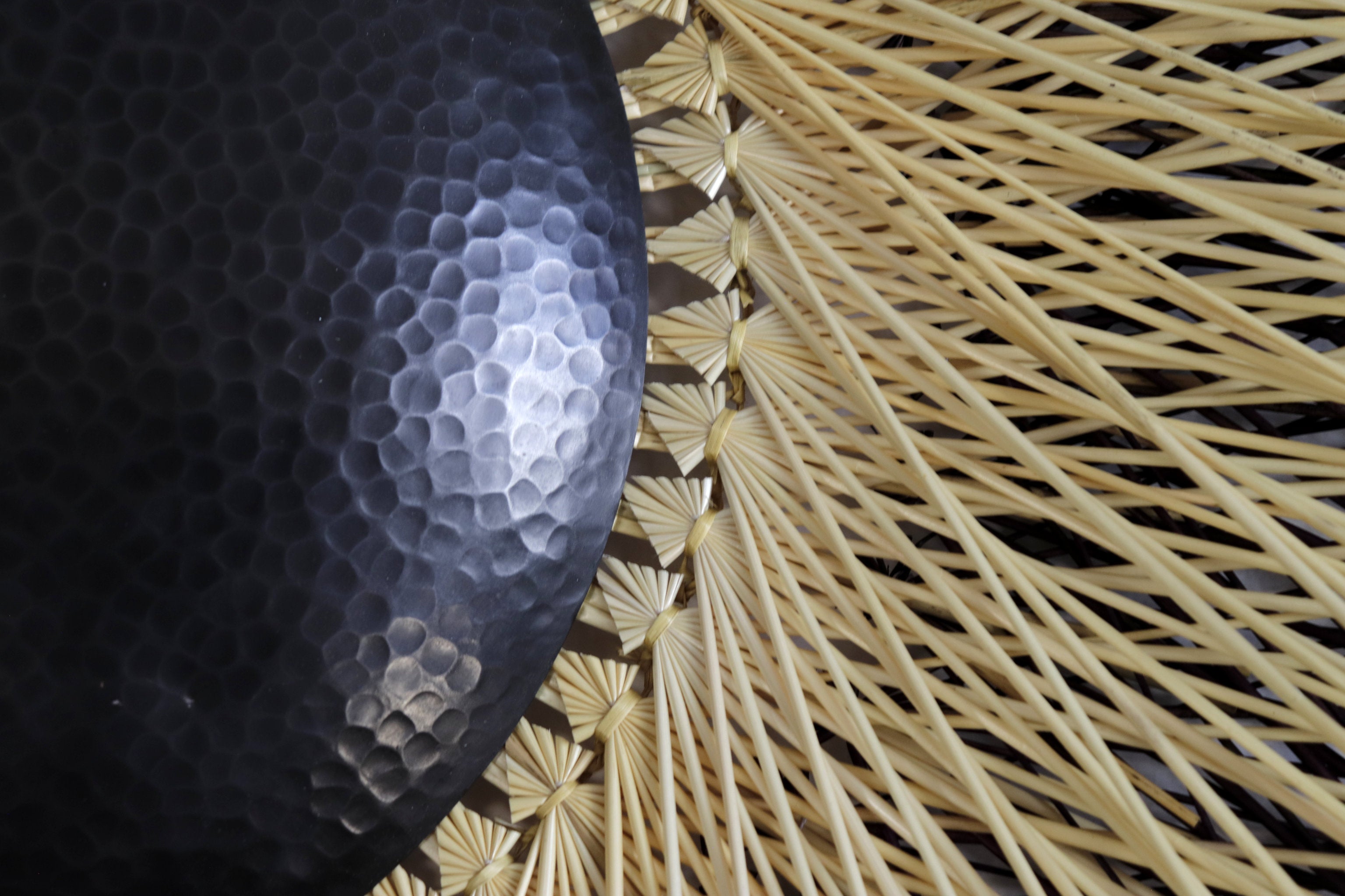 Large 40 in. hand-woven wheat straw wall circle, black eclipse design with hammered copper ring